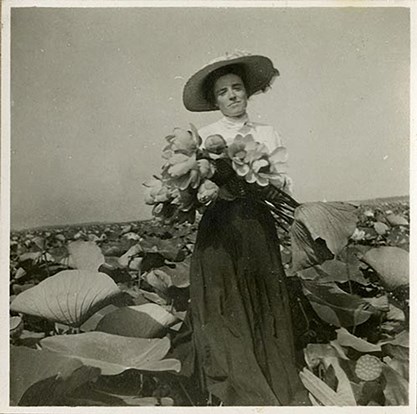 Antique photo Bess Lotus wearing a large hat and long dress