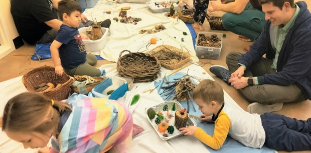 Group of children working on nature crafts at the Dunn Museum