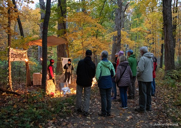 Halloween Hikes play in the woods.