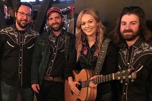 Four members of The Mackenzie O'Brien Band.