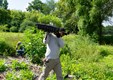 Restoration Workday volunteer planting.