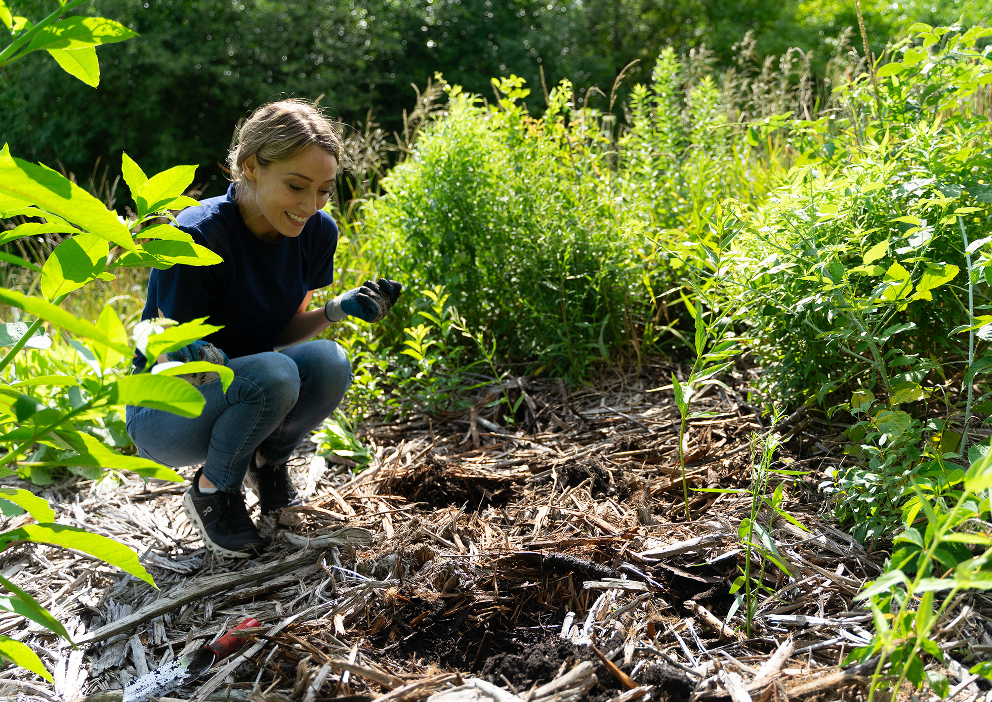 Restoration Workday volunteer planting.