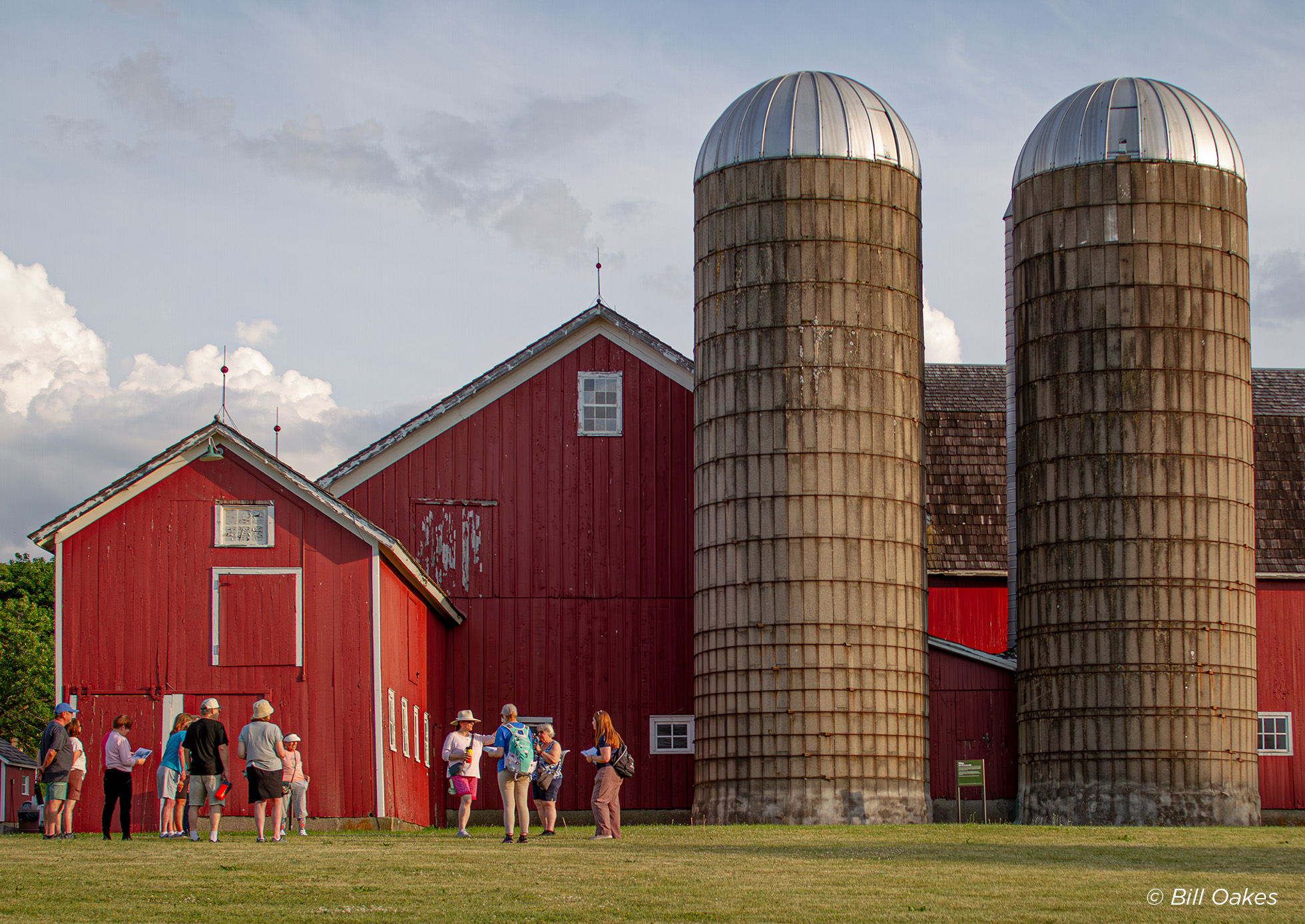 Group of people gathered around Bonner Farm on a tour.