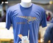 Photo of the blue Dunn Museum tshirt wtih dinosaur on it