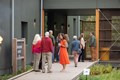 Group of people entering a building.