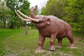 Mastodon sculpture in the park.