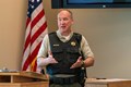 Police Sergeant talking to a group of police officers.