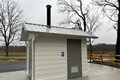Outdoor restroom in the park.