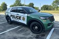 Green and white squad car, Lake County Forest Preserve Police.